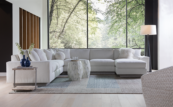 Artistica Upholstery scene featuring a sectional, a side table, and two accent tables.